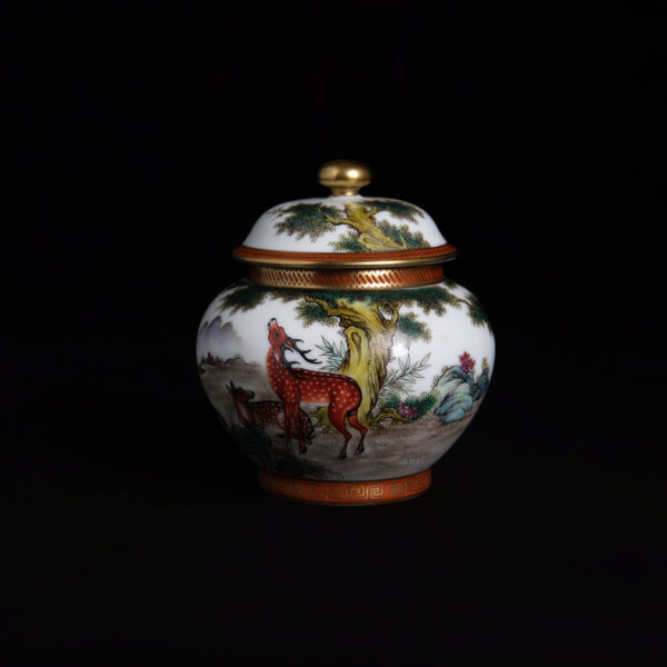 (From an Old Collection) Famille Rose Covered Jar with Pine and Deer Motif and Gilt Accents