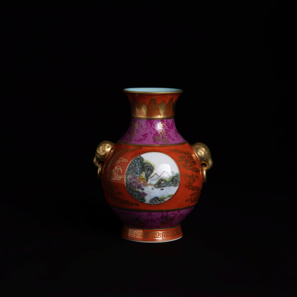 (From an Old Collection) Coral-Red Ground, Gilt-Decorated Famille Rose Enameled Vase with Landscape Design in Openwork Panels, Featuring Elephant-Ear and Ring Handles