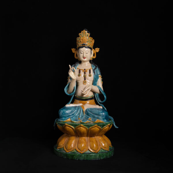 (From an Old Collection) Tri-Color Glazed and Painted Seated Figure of Guanyin Bodhisattva in the "Relaxed" Posture