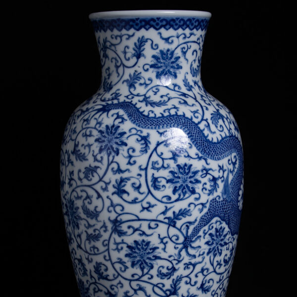 (From an Old Collection) Blue Porcelain Bottle with Floral Patterns and Dragon Design, featuring a Bodhisattva figure