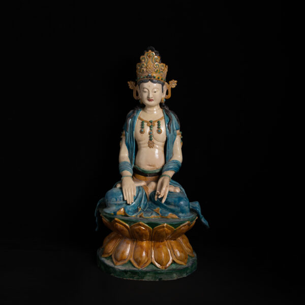 (From an Old Collection) Tri-color glazed painted white Tara seated statue on a lotus pedestal