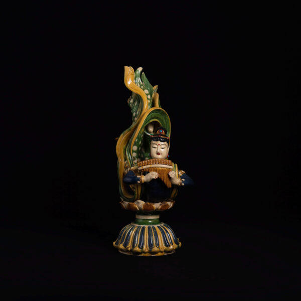 (From an Old Collection)Three-color glazed statue of a dancing celestial being holding a pipa and standing upright