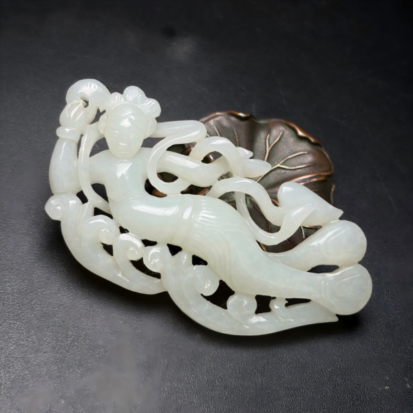 Lacquered jade carving of a flying celestial maiden