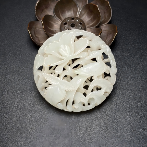Lacquered jade pendant carved from andite jade