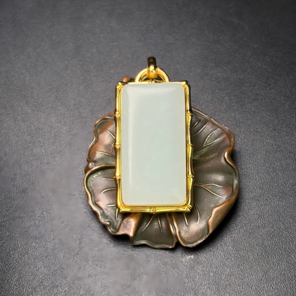 Heitan jade inlaid with the peace charm of "Zhineng Gaozheng" (meaning "continuously rising")