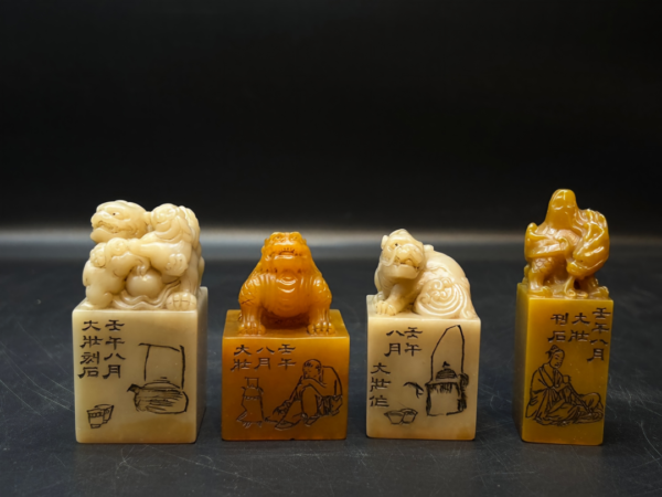 Four-piece set of Tan Huang and Bai Tan jade pieces